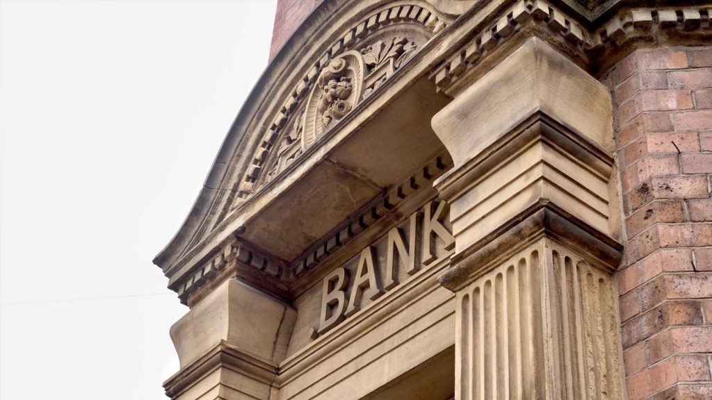 marble facade with 'bank' on the front